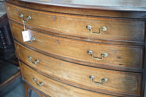 A Regency satinwood banded mahogany bowfront four drawer chest, width 100cm, depth 51cm, height 93cm